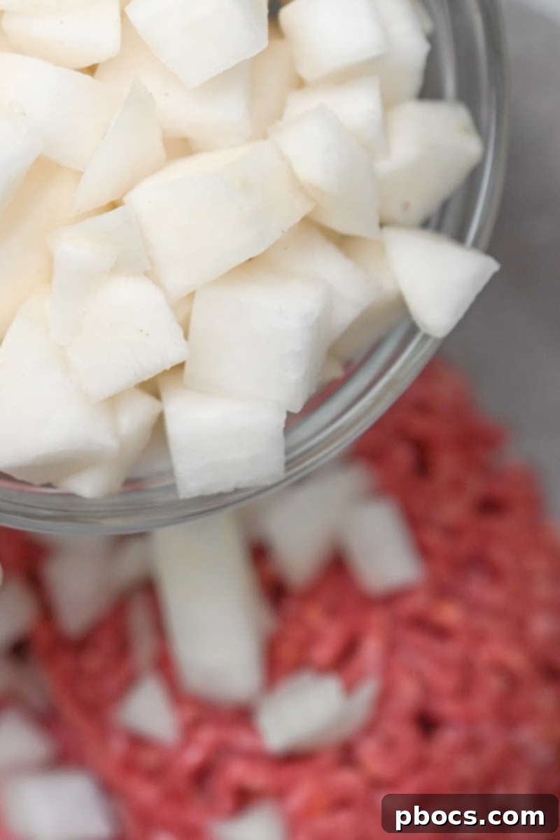 Close-up of creamy Low-Carb Shepherd's Pie Soup with tender turnips and ground beef