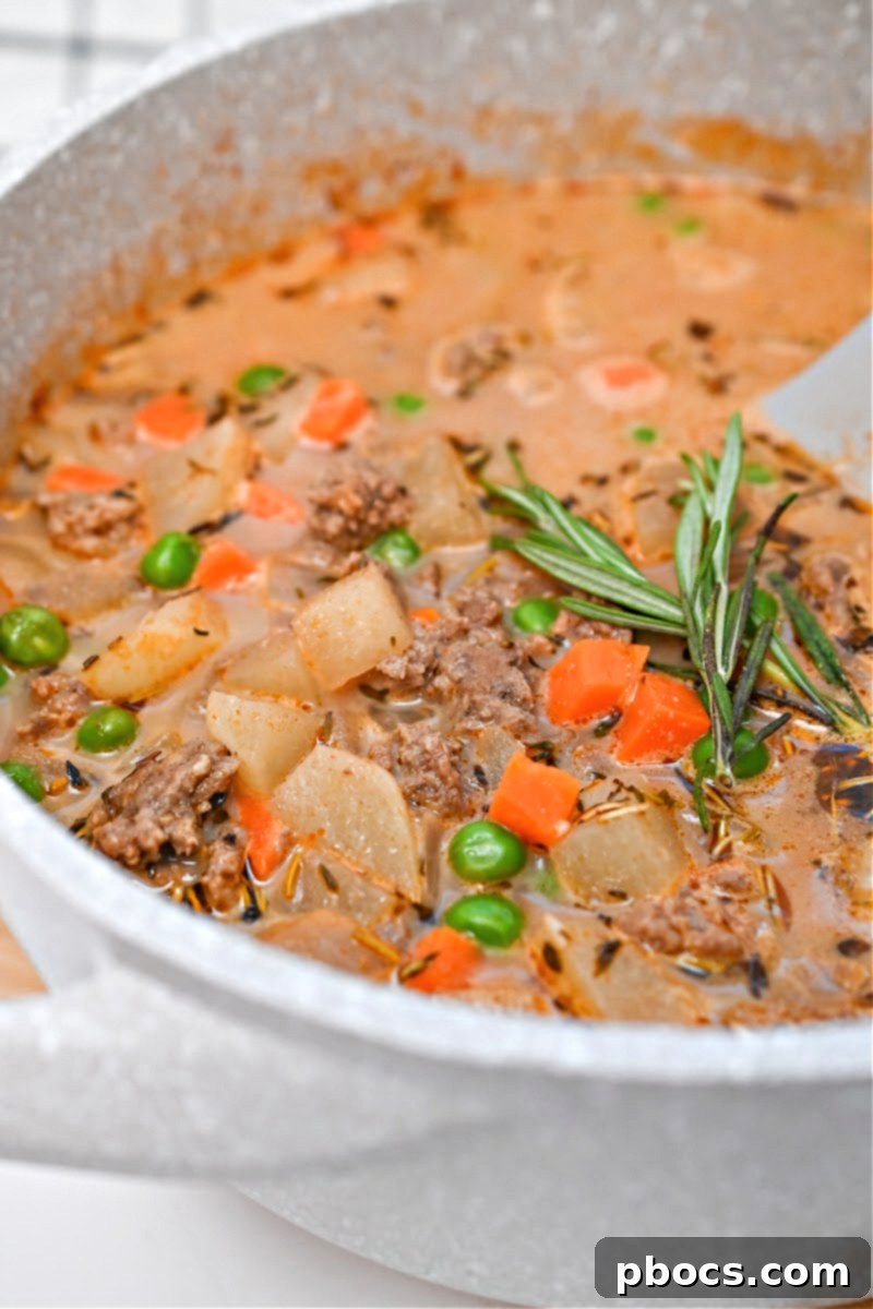 Low-Carb Shepherd's Pie Soup served with a side dish of salad