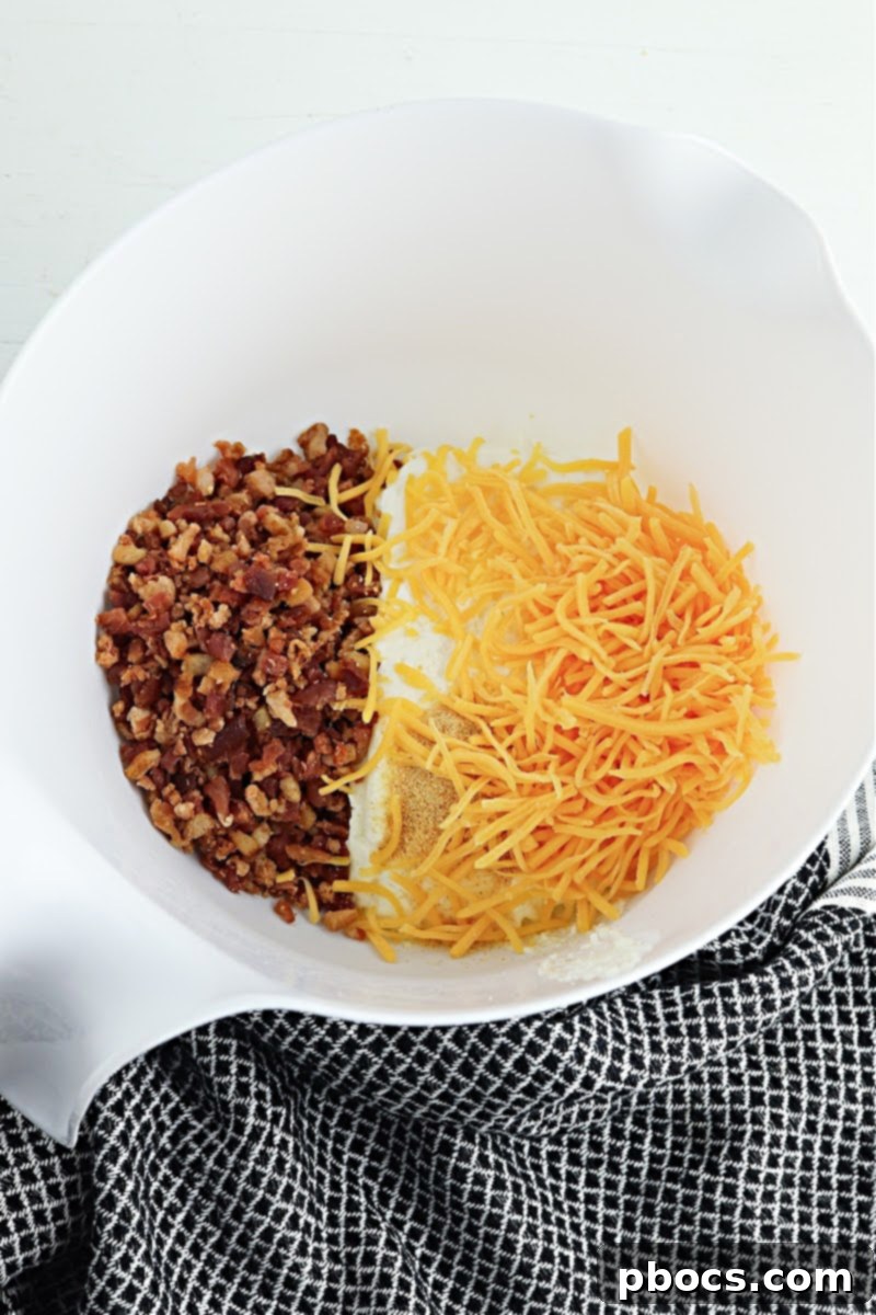 Mixing ingredients for pepper popper filling