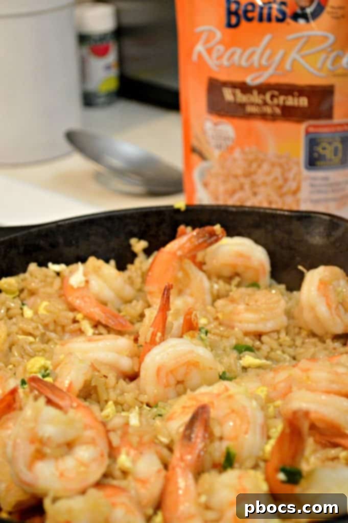 Mixing Shrimp and Rice in Pan