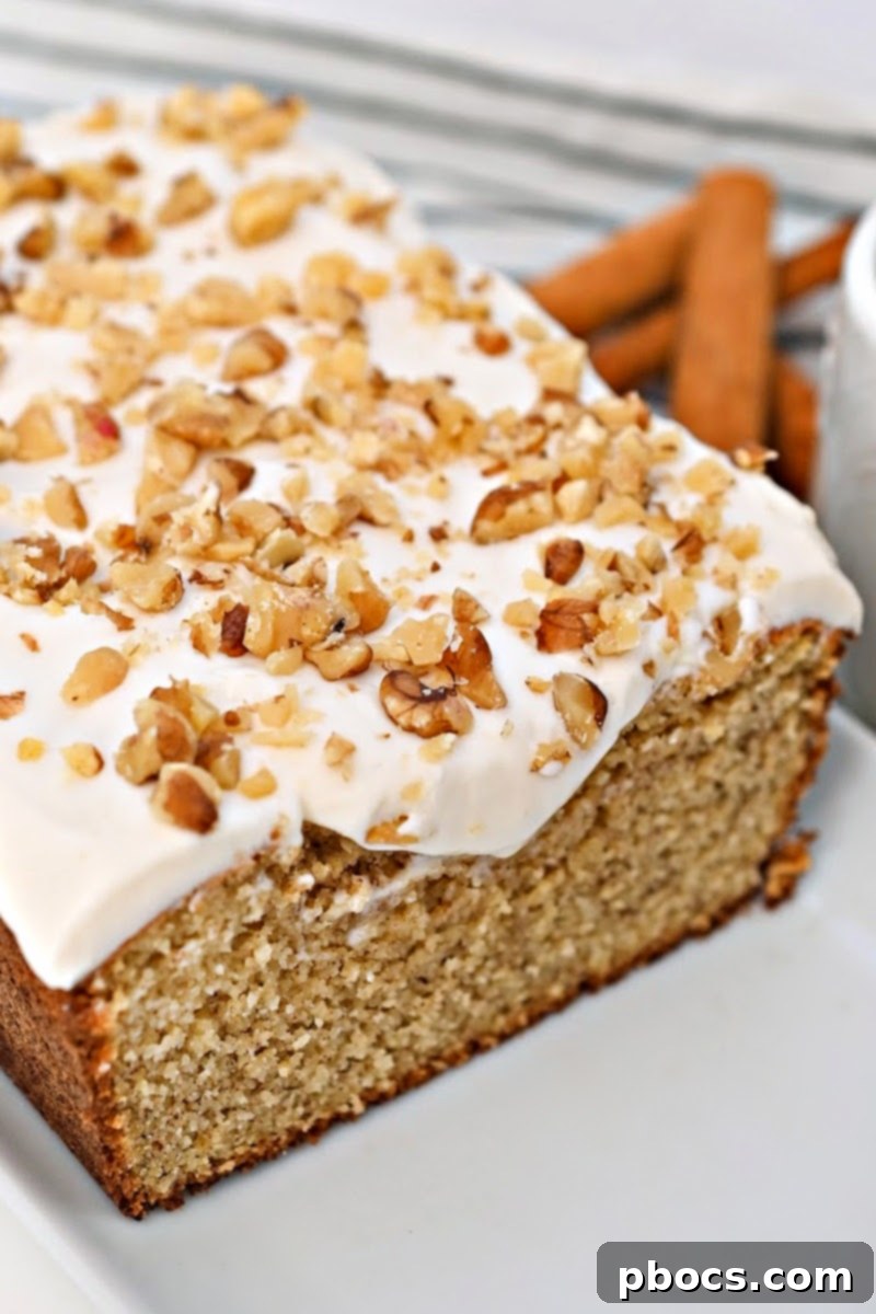 A freshly baked Keto Starbucks Gingerbread Loaf on a cooling rack, ready for frosting.
