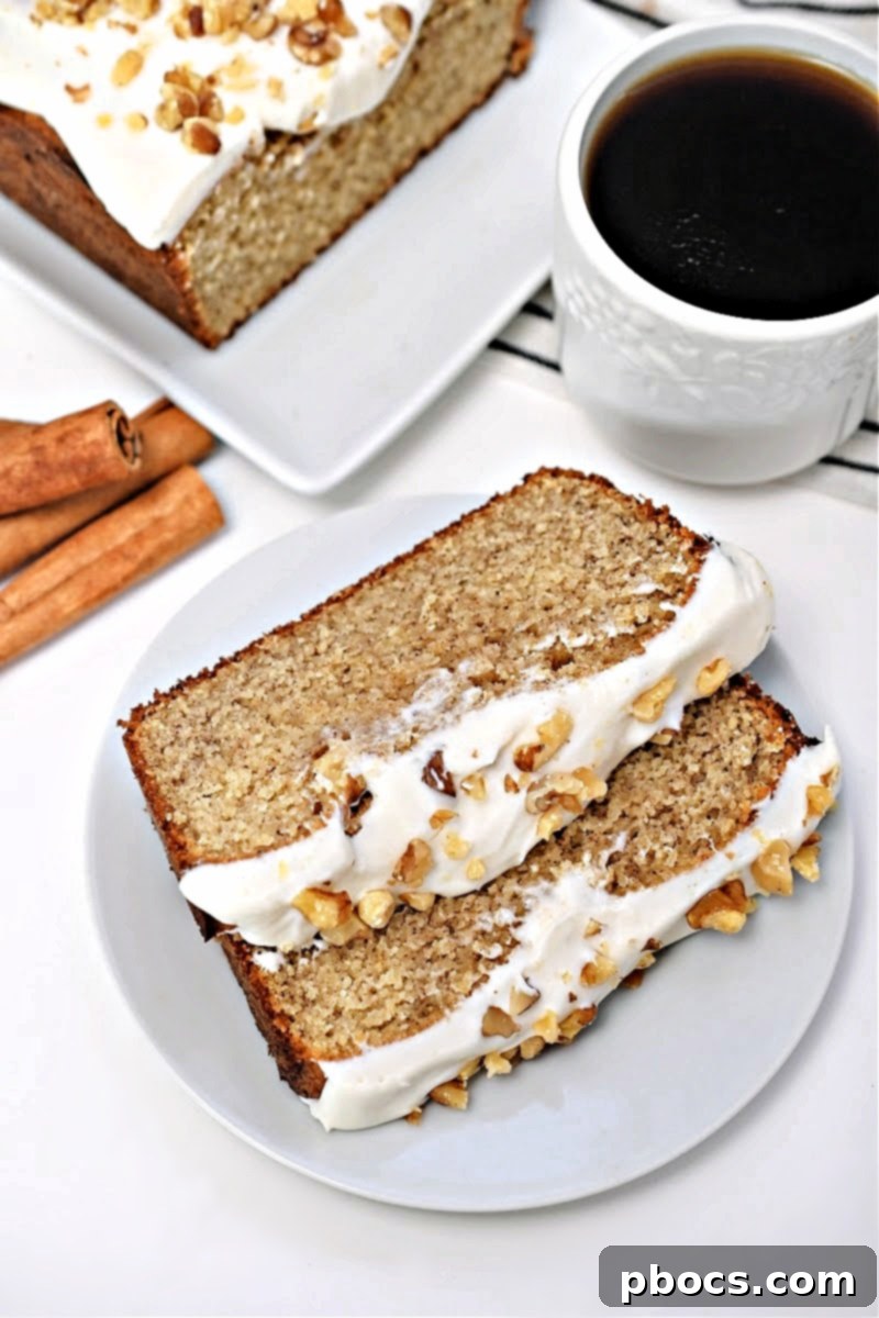 Two generous slices of Keto Starbucks Gingerbread Loaf served with a hot cup of coffee, ready for breakfast or dessert.