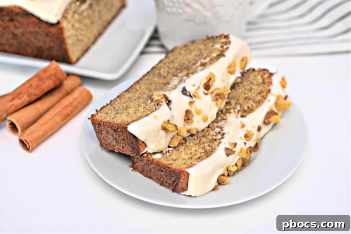 A large Keto Starbucks Gingerbread Loaf with creamy white icing, perfect for holiday gatherings.