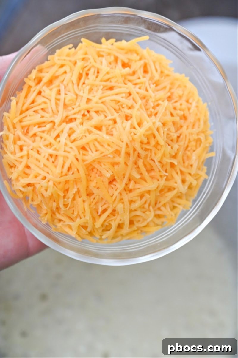 Thickening heavy whipping cream for cheese sauce