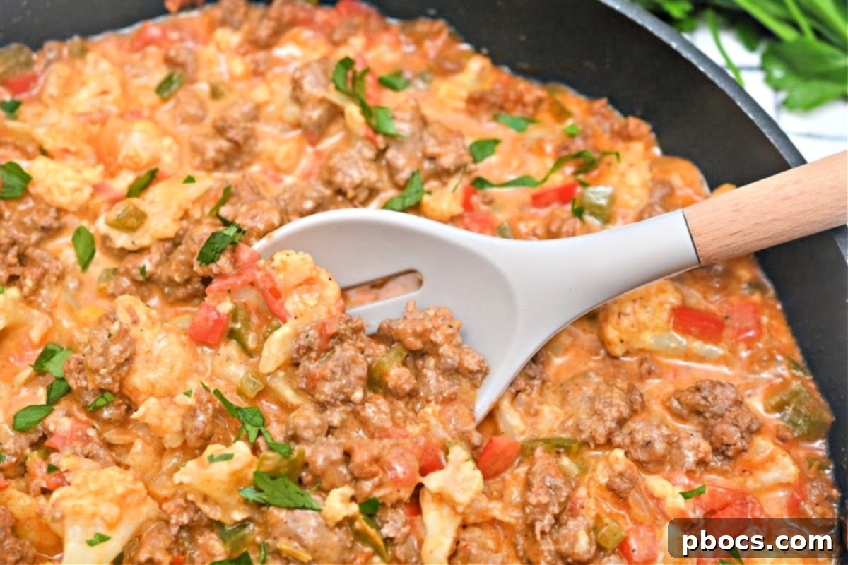 Close-up of Keto Chili Mac Skillet with melted cheese