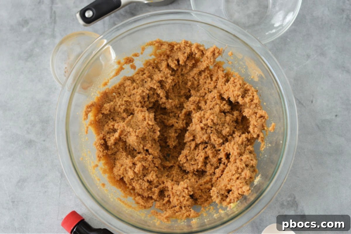 Mixing cookie ingredients for Keto Pumpkin Coffee Cake Cookies