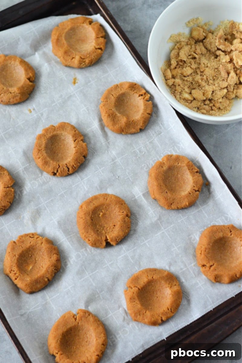 Forming cookie balls for Keto Pumpkin Coffee Cake Cookies
