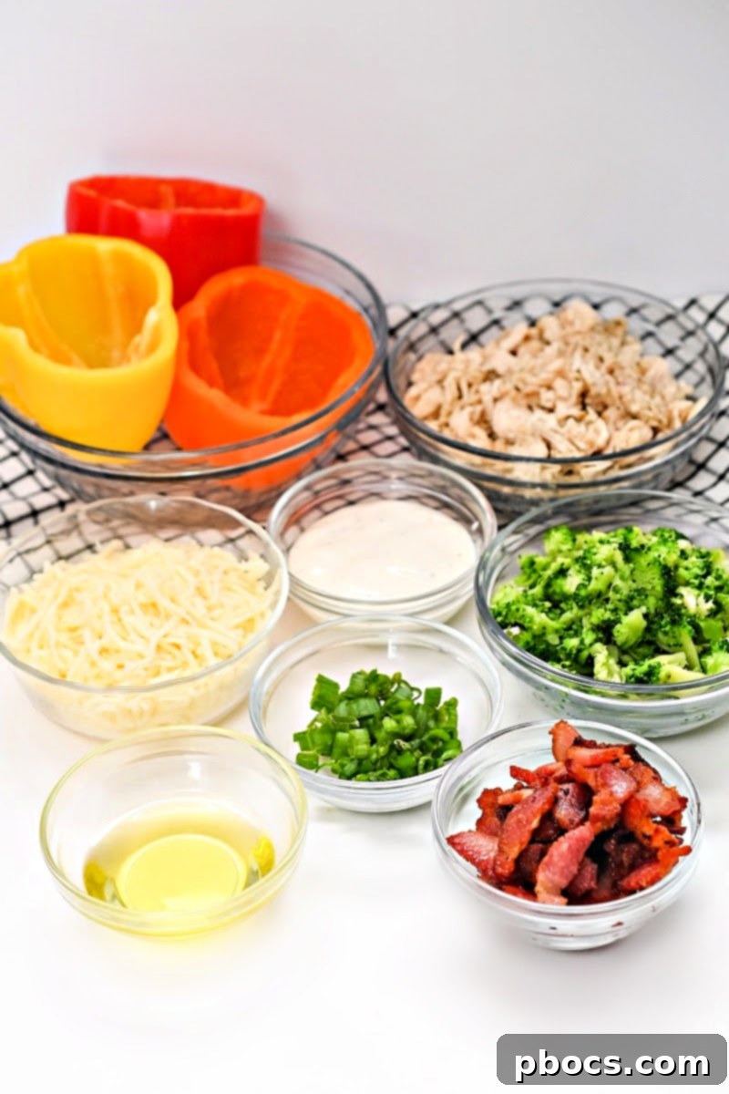 Serving of Keto Ranch Chicken and Broccoli Stuffed Peppers in a baking dish