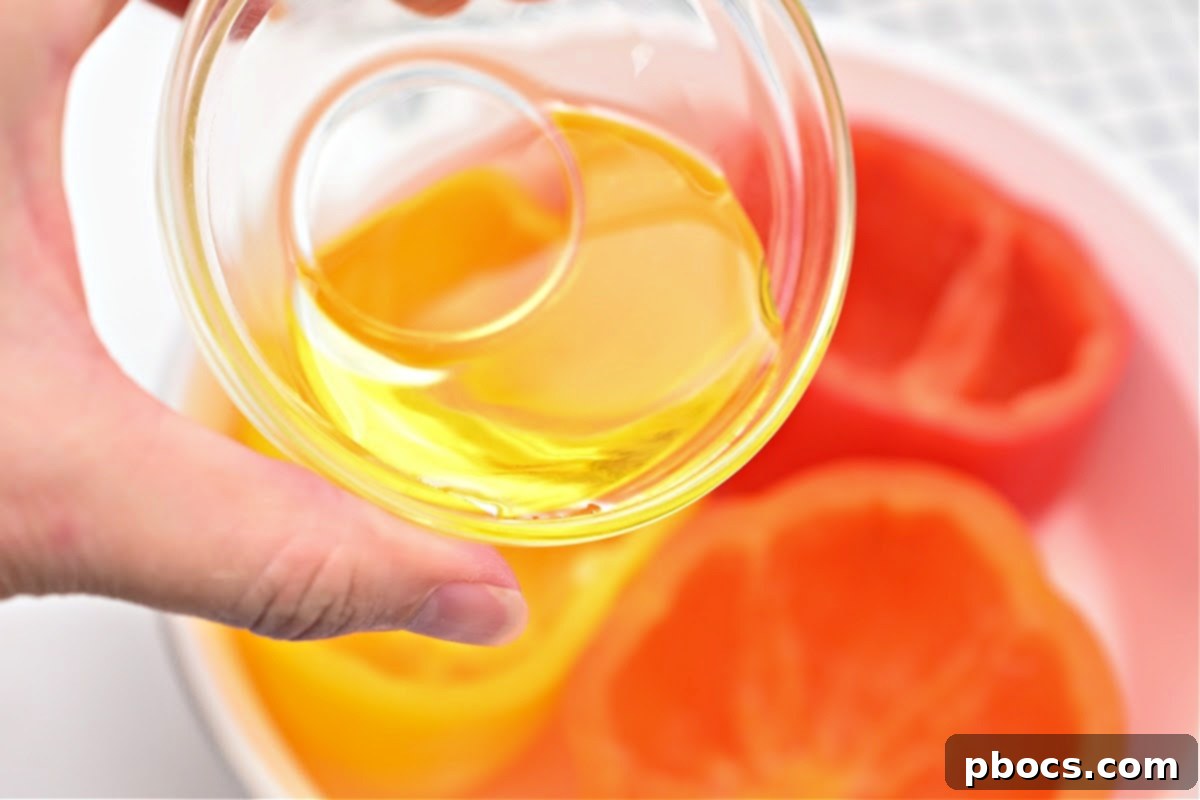 Bell peppers with tops removed and seeds scooped out, ready for baking