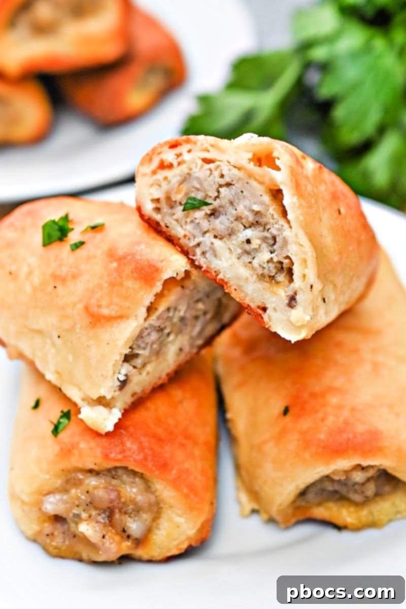 Platter of Keto Sausage Rolls with a garnish