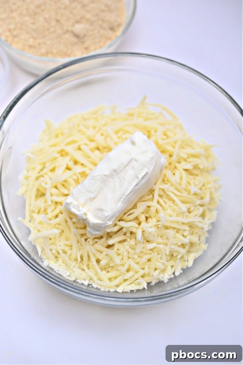 Melted cream cheese and mozzarella in a bowl