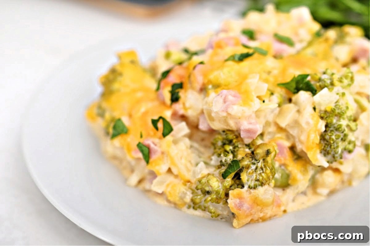 Baked cheesy low-carb broccoli rice casserole with ham