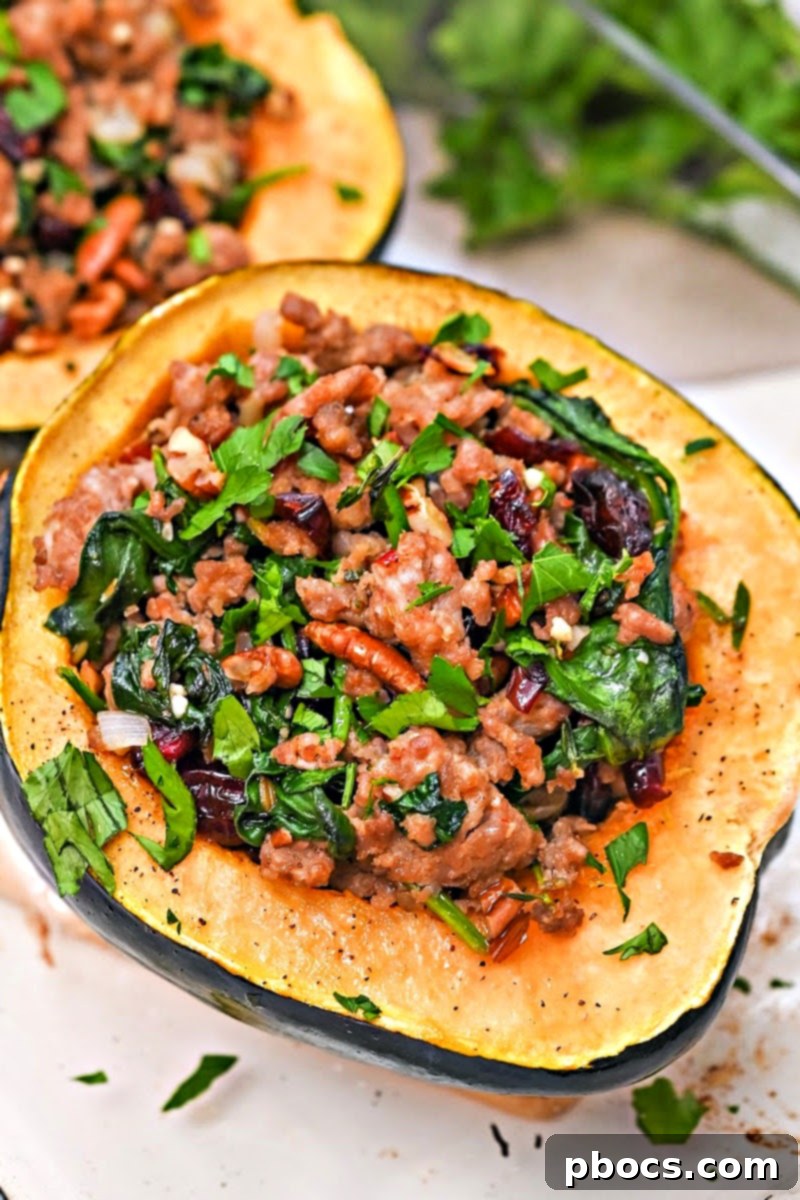 Delicious Roasted Acorn Squash with Savory Sausage and Tart Cranberries