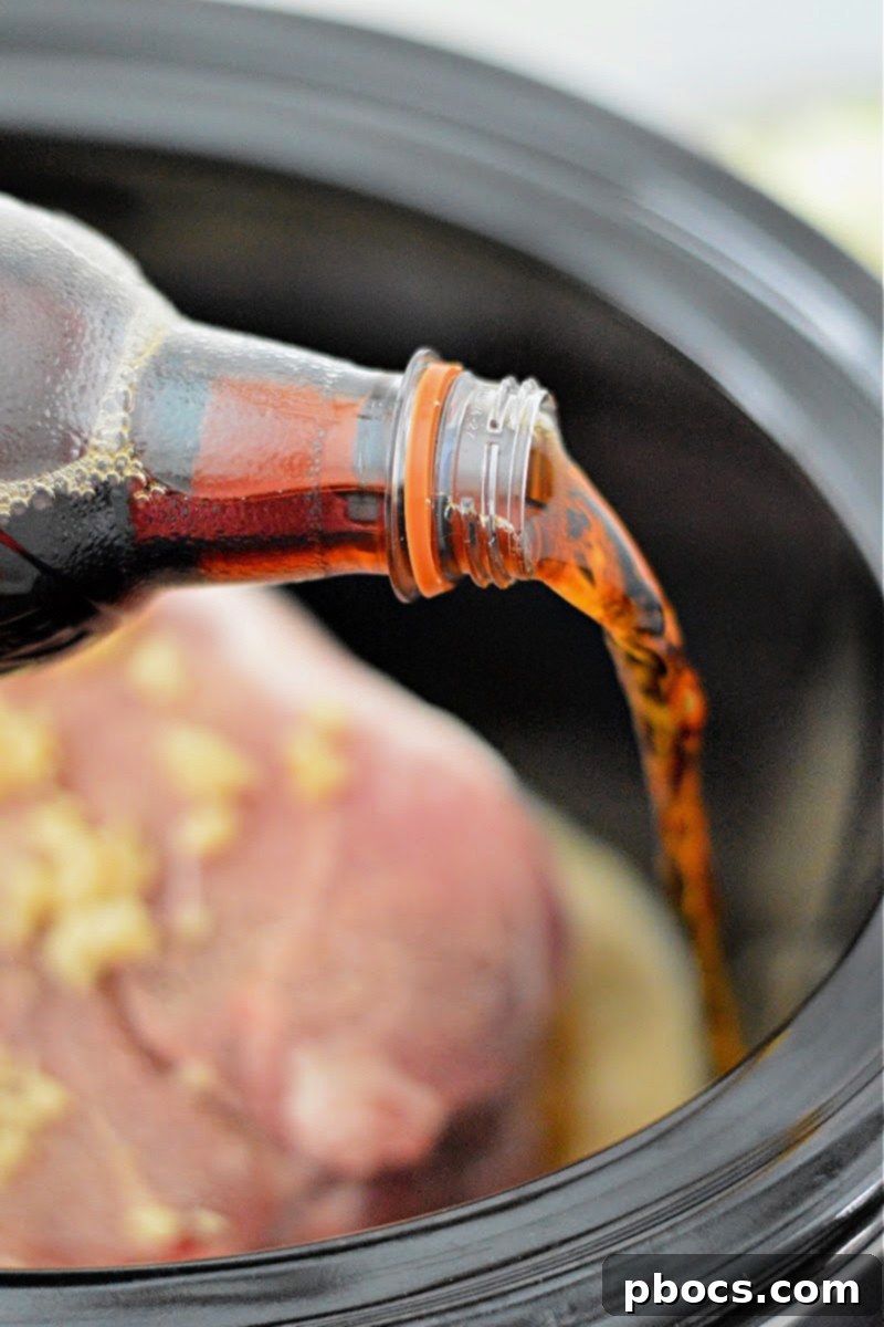 Step 3: Pouring zero sugar root beer into the Crockpot