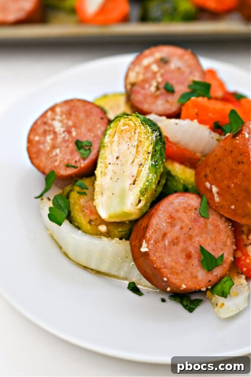 A beautifully plated serving of Low Carb Honey Garlic Sausage and Veggies, highlighting the delicious texture and glaze.