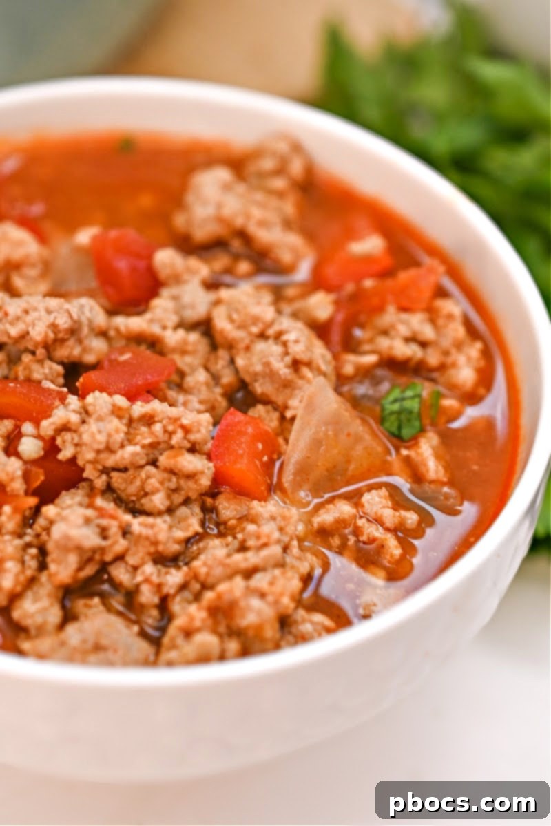 A white bowl filled with naturally sweet keto pumpkin chili