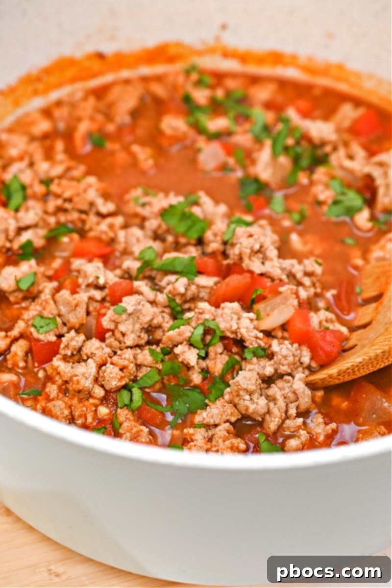 A container of Keto Pumpkin Chili, ideal for meal prep and storage