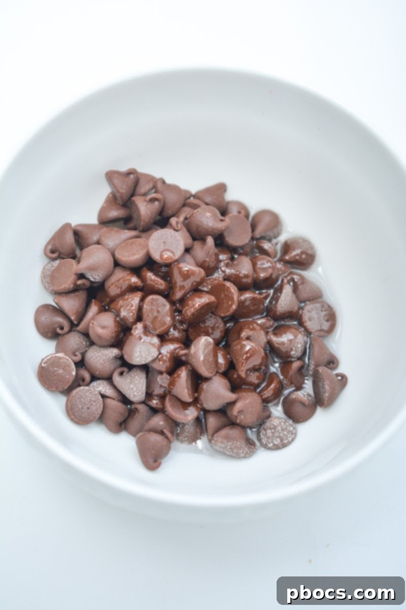 Lily's chocolate chips in a microwave-safe bowl, ready for melting.