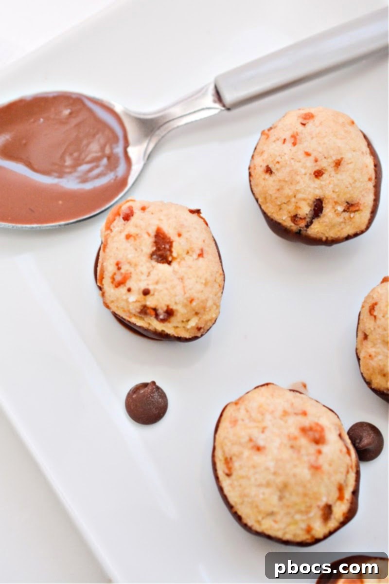 Keto Maple Bacon Bites next to a spoon of melted chocolate, illustrating the coating process.