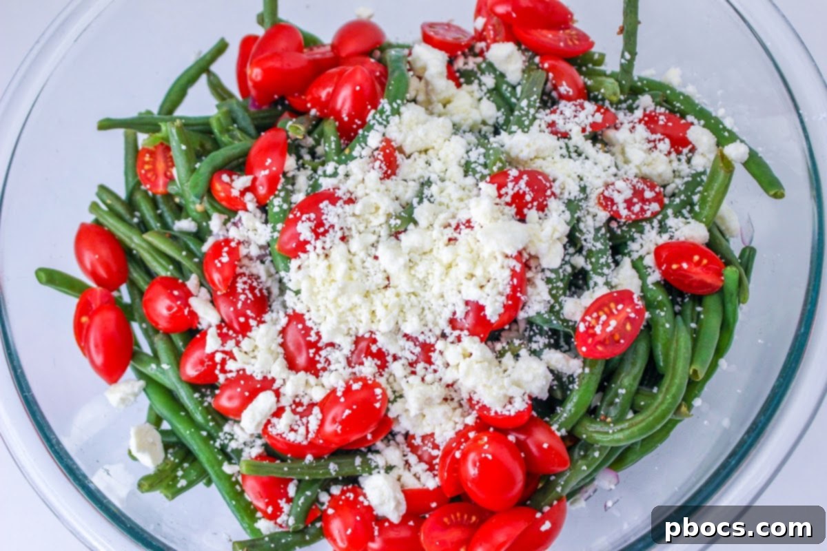Adding Feta Cheese to the green bean salad