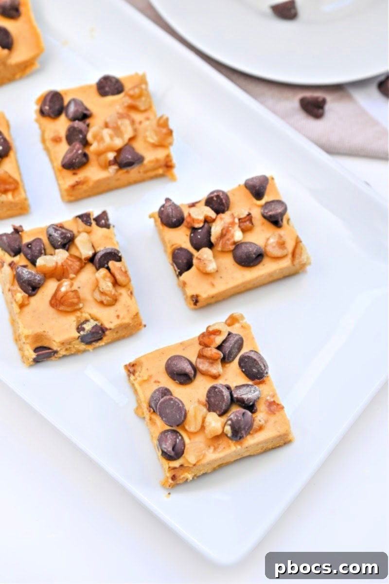 Keto Pumpkin Fudge, showing the creamy texture and pumpkin hue