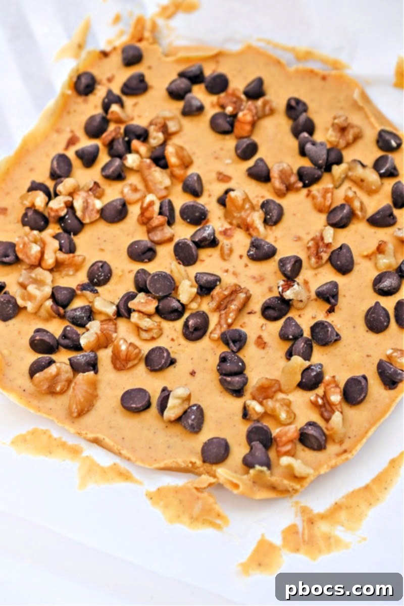 The set fudge before it is cut into cubes, showcasing its firm texture