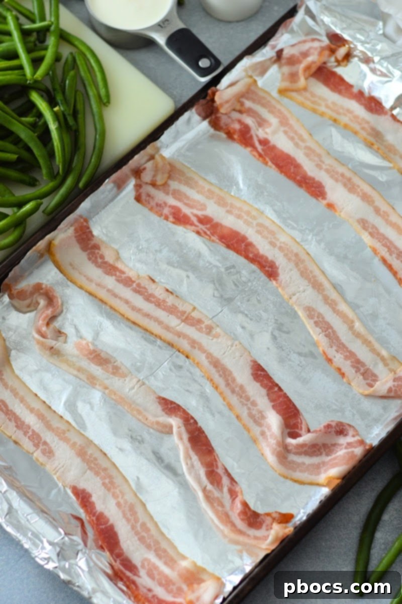 Putting raw bacon on a baking sheet.