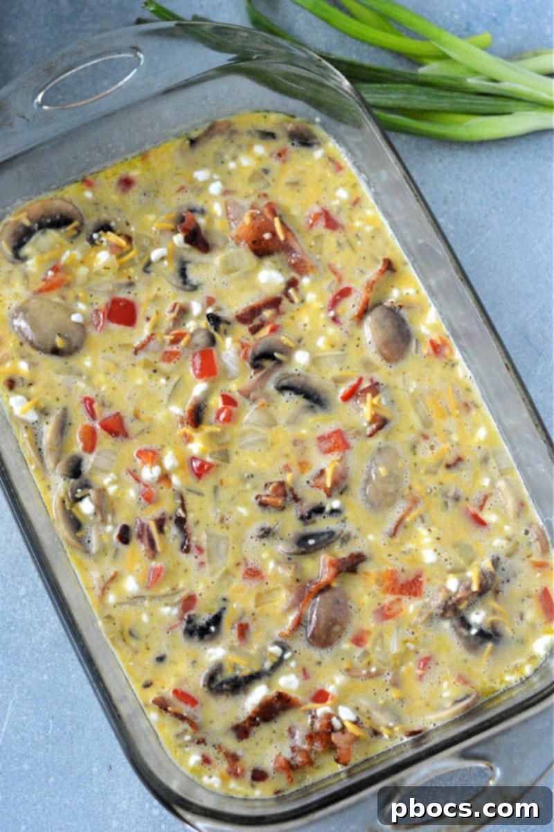 The unbaked casserole in the casserole dish