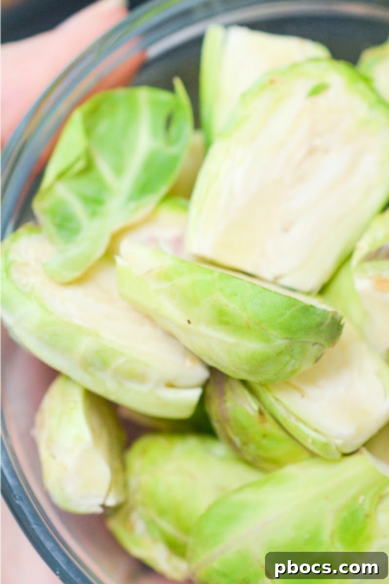 Brussels Sprouts, Onions, and Mushrooms in a skillet - Step 4