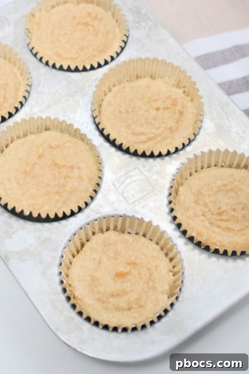 Delectable Keto Snickerdoodle Muffins 9 Mixing the batter for Keto Snickerdoodle Muffins