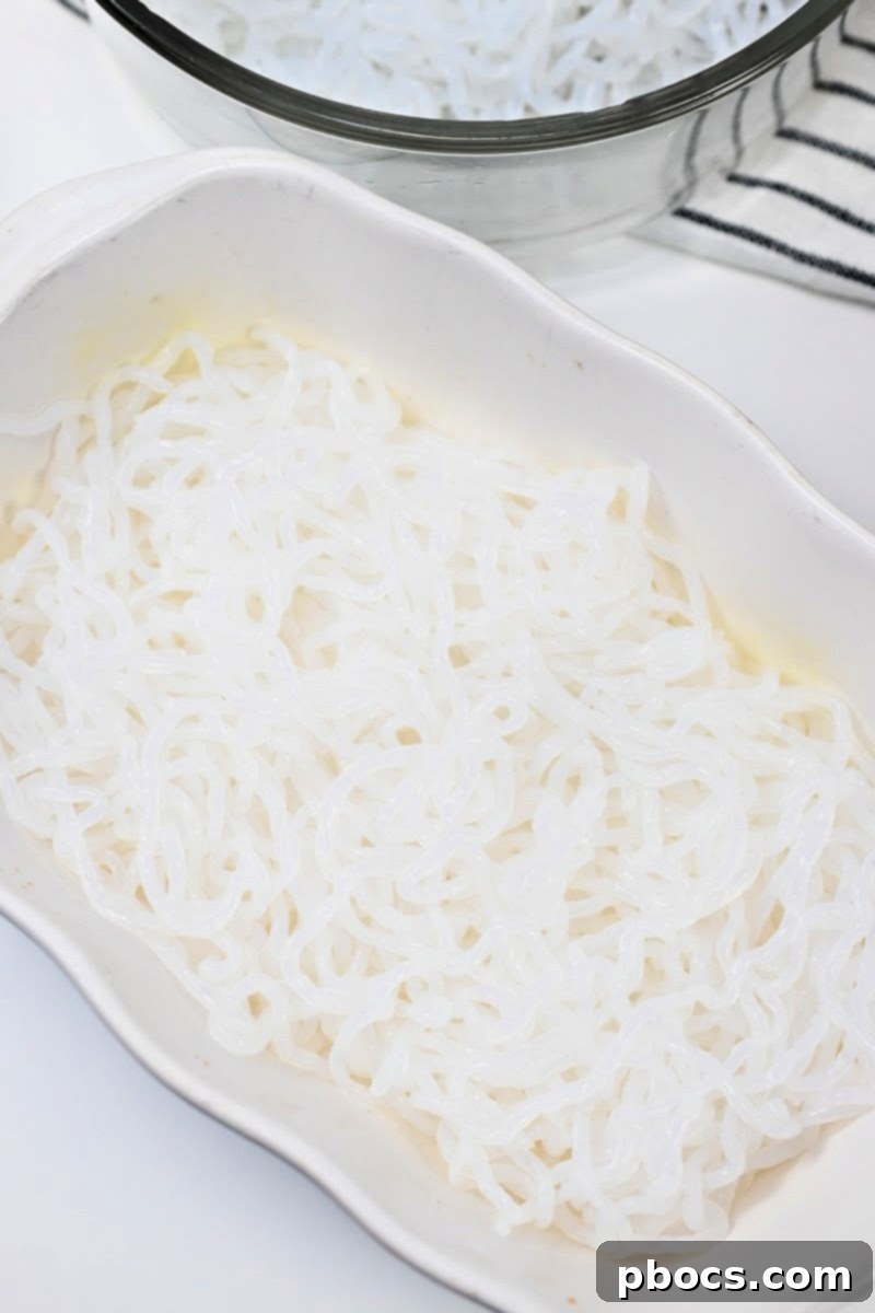 Keto Ramen Lasagna TikTok Style 9 Layering Miracle Noodles in a casserole dish for lasagna.