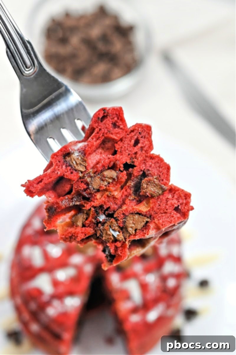 Close-up of fluffy Keto Chocolate Chip Red Velvet Waffles