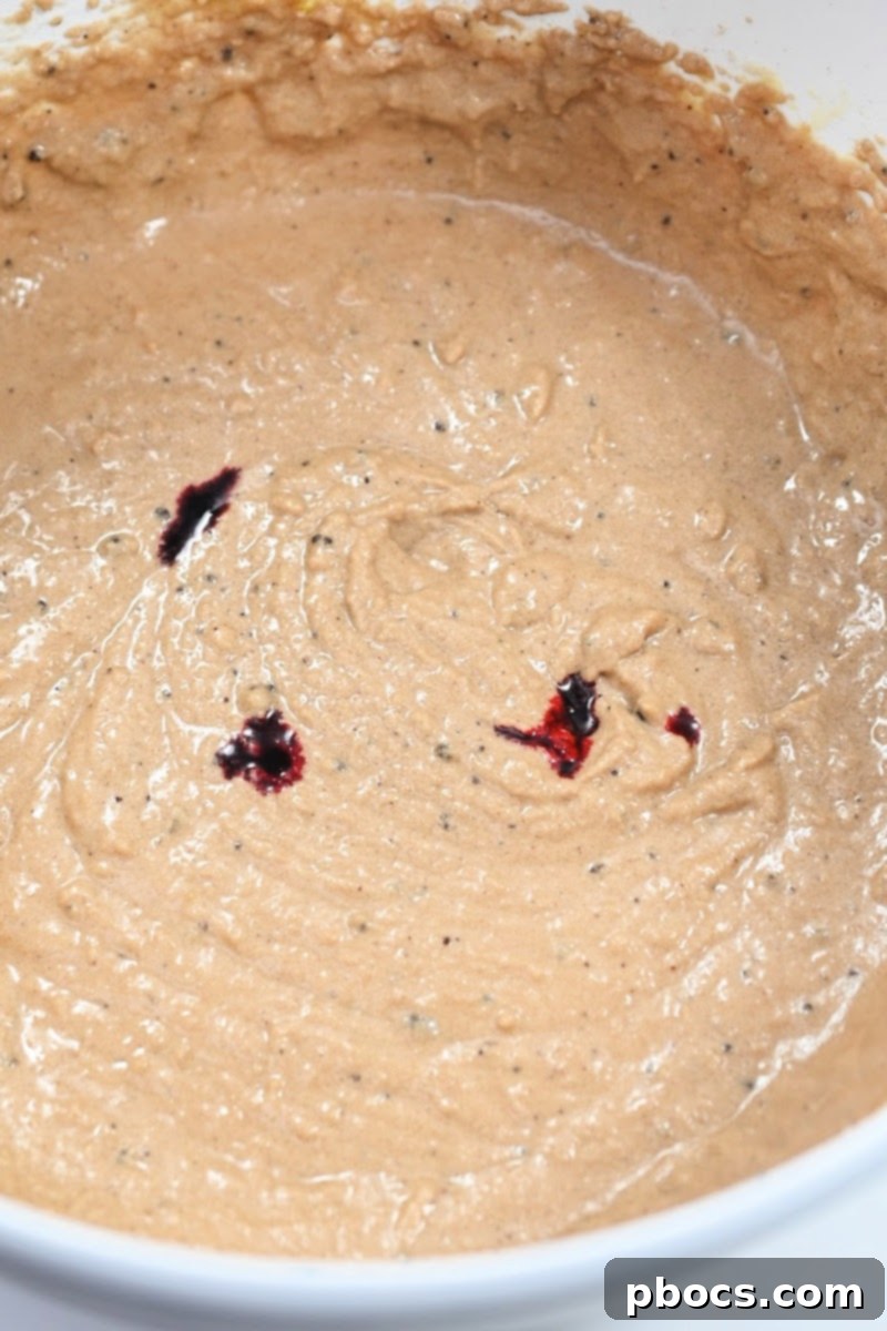 Adding red food coloring to red velvet waffle batter