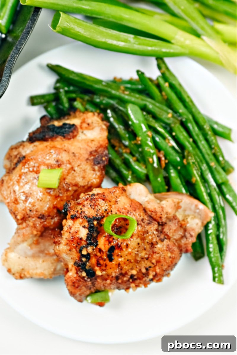 Keto Honey Garlic Chicken with Green Beans 7 Portioned Keto Honey Garlic Chicken and Green Bean Skillet in a meal prep container, ready for storage.