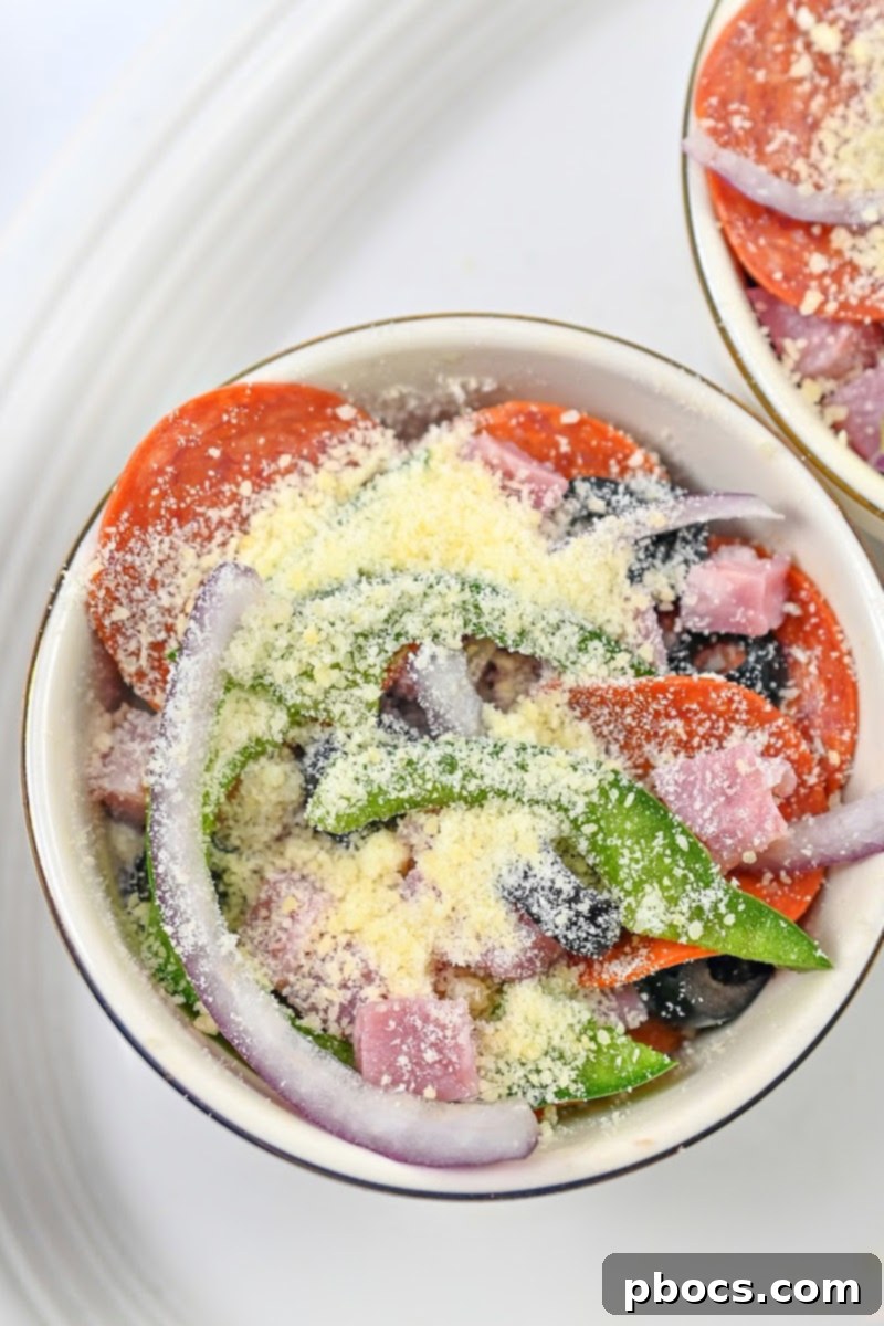 Adding parmesan cheese on top