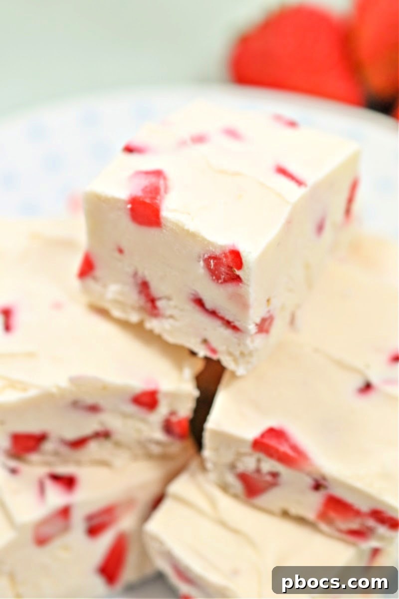 Decadent Keto Strawberry Fudge 3 Close-up of fluffy Keto Strawberry Cream Fudge squares on a platter