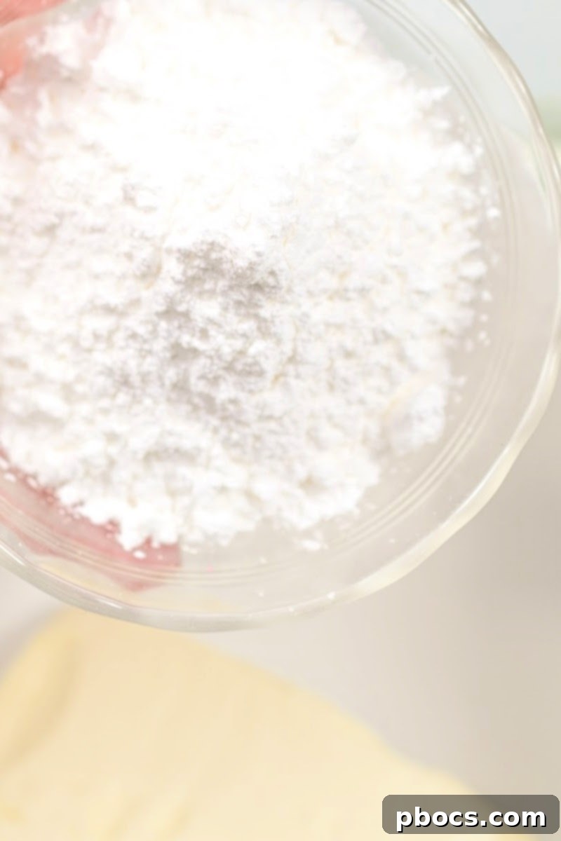 Decadent Keto Strawberry Fudge 9 Mixing cream cheese and Swerve Confectioner's Sugar Substitute