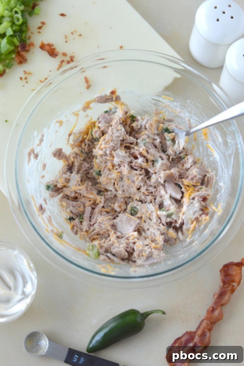 Finished Keto Jalapeno Popper Tuna Salad garnished with fresh green onions