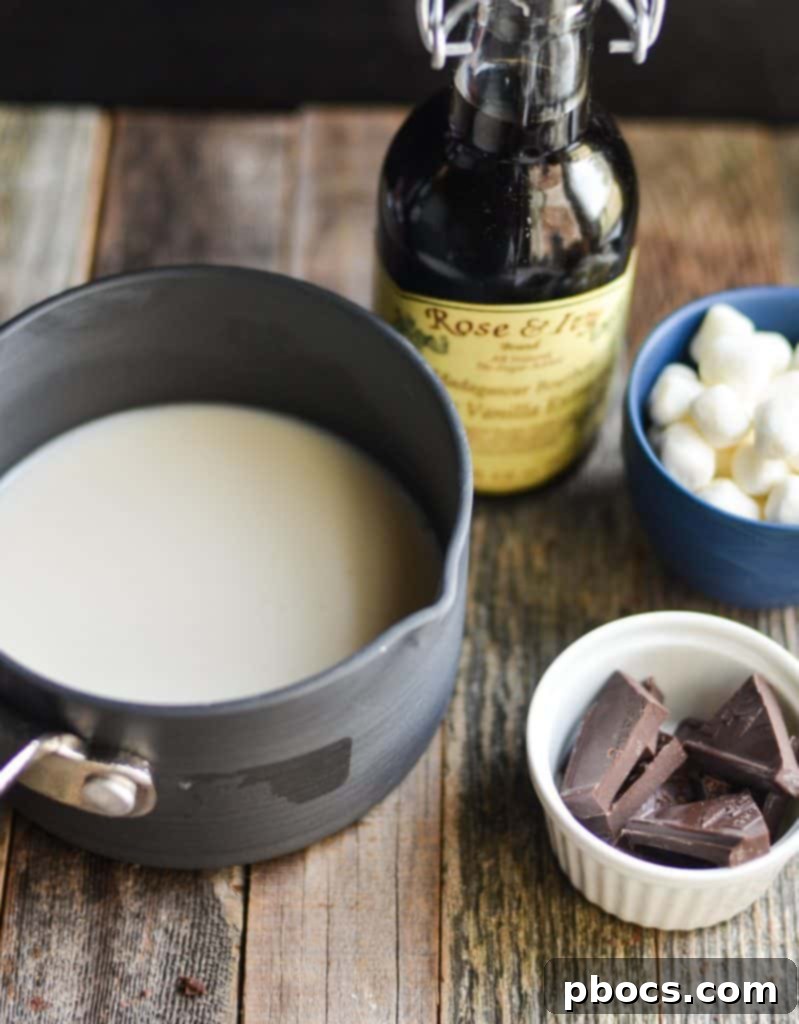 Homemade Bourbon Spiked Hot Chocolate Heating milk gently on low heat in a saucepan for homemade hot chocolate.