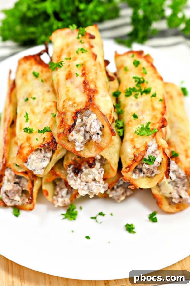 Keto Sausage Lasagna Pinwheels 2 Delicious Keto Sausage Lasagna Rollups ready to be served