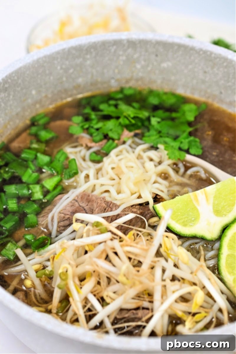A beautifully plated bowl of Keto Beef Pho, ready to eat