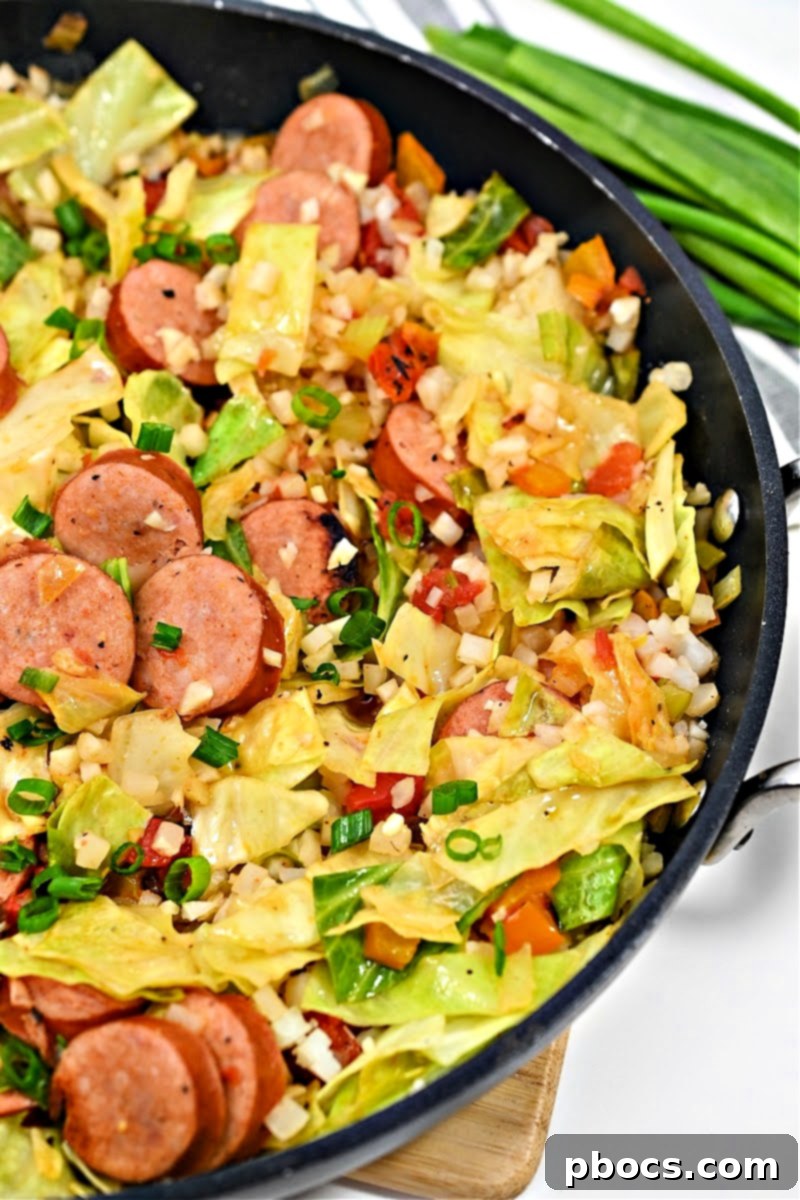 Finished Keto Cabbage Jambalaya Skillet ready to serve – A close-up of the delicious and healthy low-carb jambalaya with Andouille sausage and fresh vegetables.