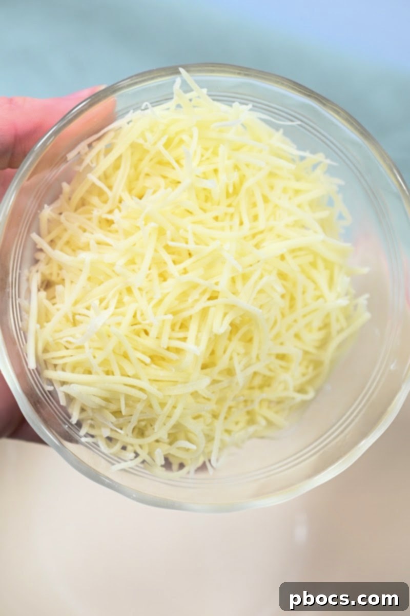 Keto Stuffed Pork Chops with Cheesy Broccoli 11 Mixing the cheesy broccoli filling