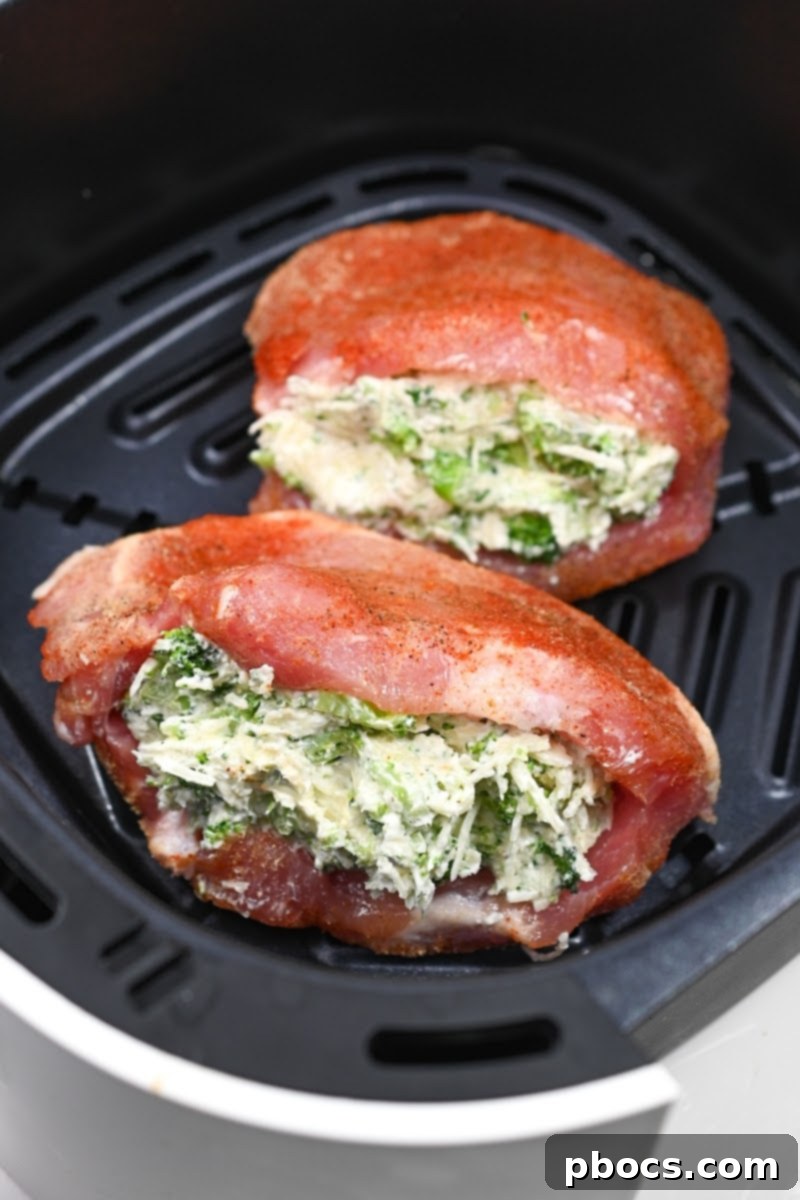 Keto Stuffed Pork Chops with Cheesy Broccoli 12 Stuffing the pork chops with the broccoli cheese mixture