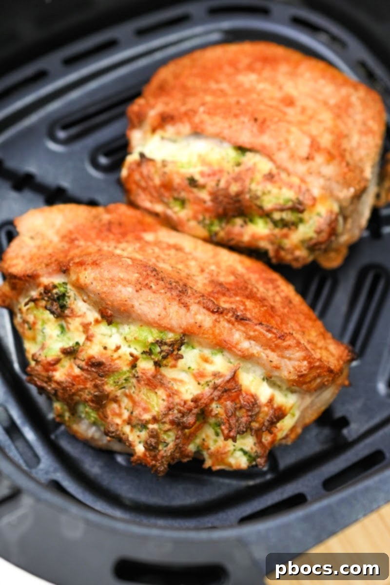 Keto Stuffed Pork Chops with Cheesy Broccoli 13 Cooked Keto Cheesy Broccoli Stuffed Pork Chops in Air Fryer