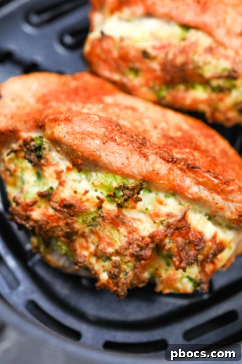 Keto Stuffed Pork Chops with Cheesy Broccoli 5 Cooking Keto Cheesy Broccoli Stuffed Pork Chops in an Air Fryer