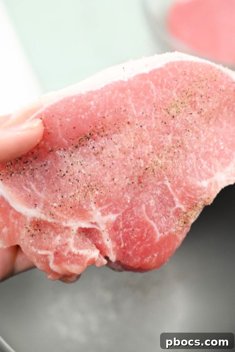 Keto Stuffed Pork Chops with Cheesy Broccoli 9 Raw Pork Chop Seasoned with Spices