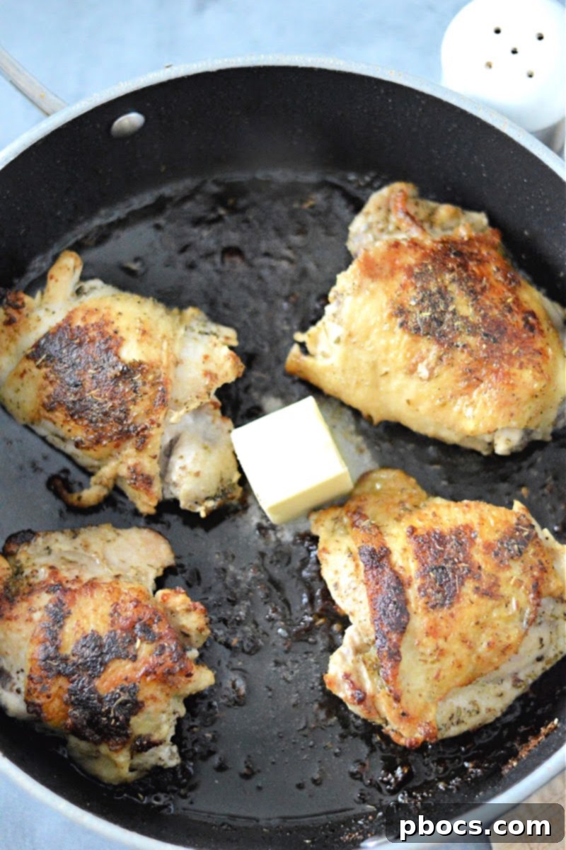 Crispy Keto Pan Chicken Thighs 10 Searing chicken thighs in a skillet