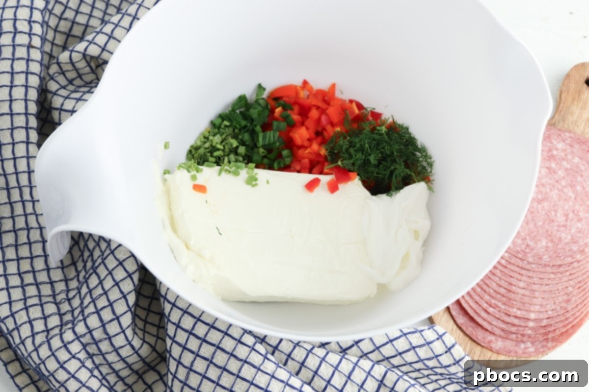 Mixing cream cheese filling for Keto Salami Tacos