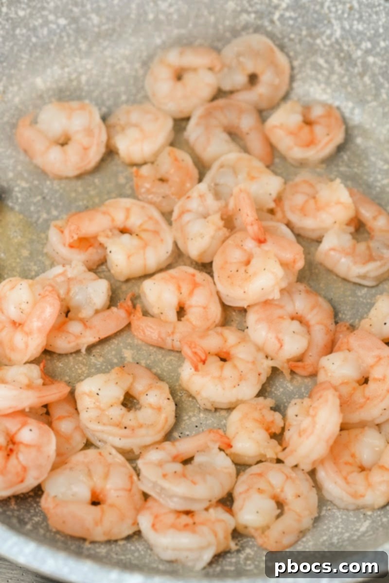 Deconstructed Keto Shrimp Egg Roll 9 Cooking Shrimp in a Skillet